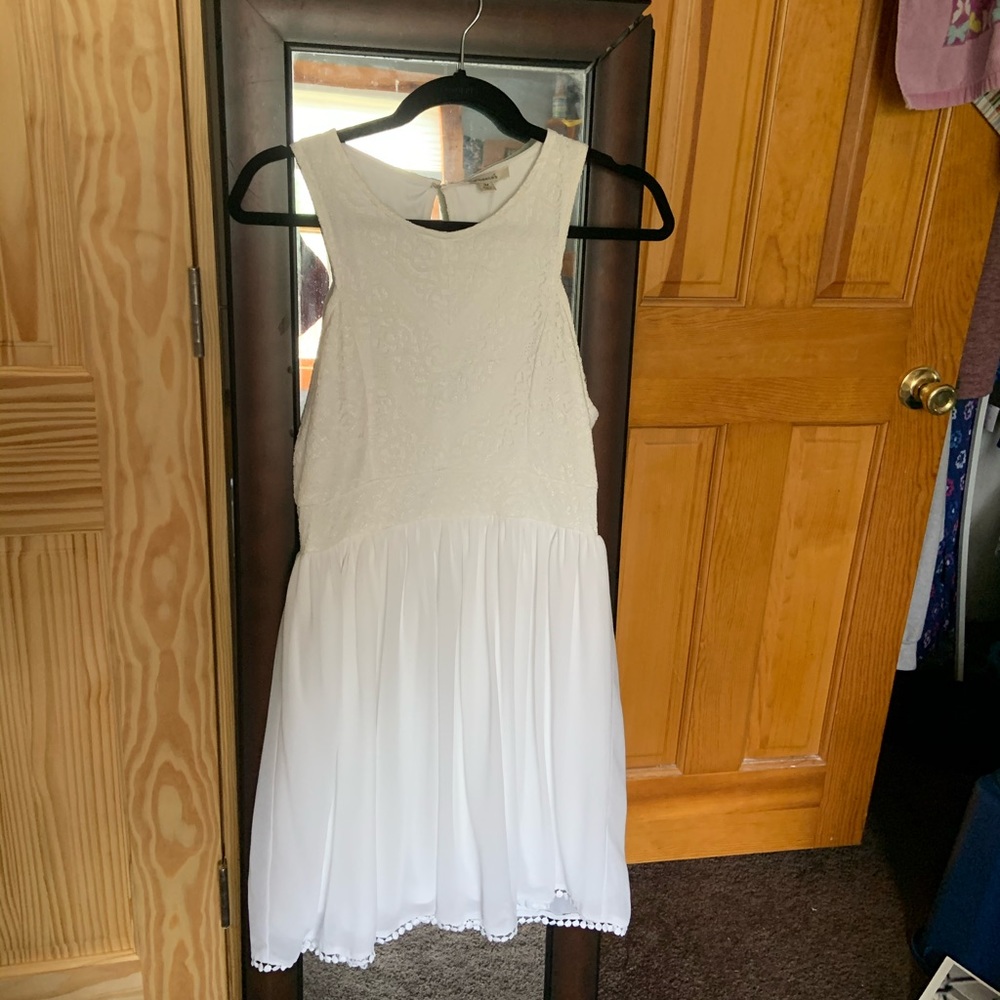 White knee length dress, cute back cutout